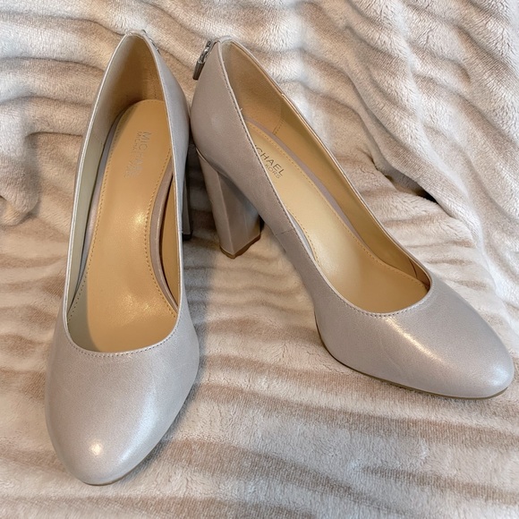 Michael Kors Shoes - New in box Michael Kors size 6.5 Leather Mira Flex Pumps. Color is Aluminum.